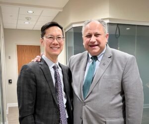 A photo of Dr Sung meeting Secretary of the Navy, Carlos Del Toro.